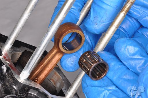 Remove the bearing from the small end of the connecting rod.