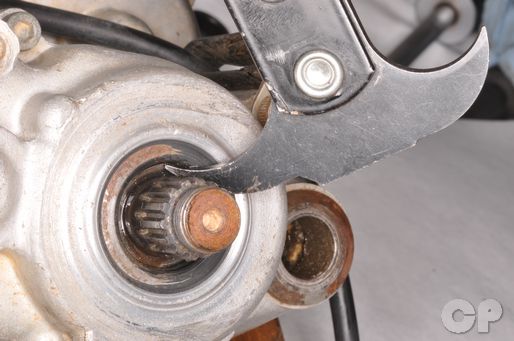 Replace the YZ-125 countershaft sprocket seal.