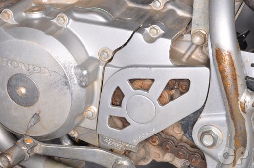 CRF150F engine sprocket cover removal is covered in the final drive chapter of the manual.