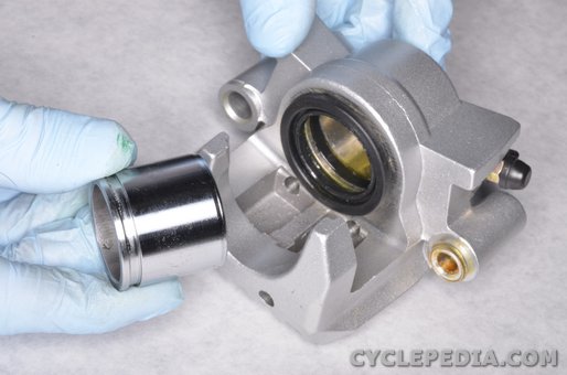 kymco uxv500 front brake caliper rebuild piston seals master cylinder