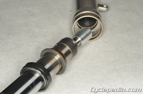 Kawasaki KLX140 front fork rebuild oil seal replacement slider guide bushing oil lock piece level weight 