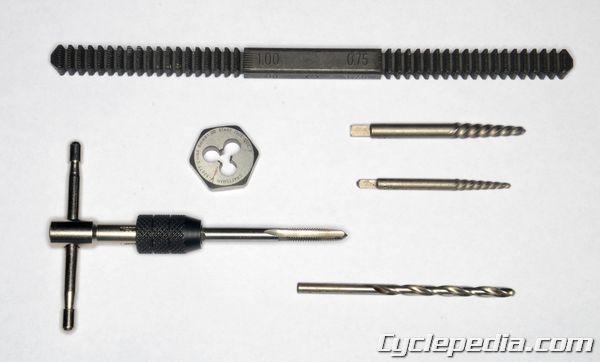 A tap and die set and screw extractor kit should be close at hand for the serious technician