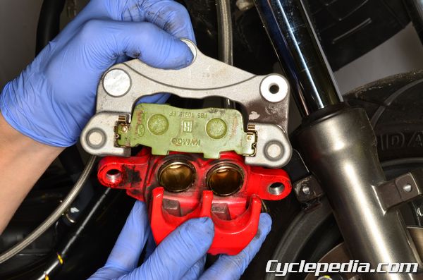 KYMCO Movie 150 brake caliper pad change seal rebuild