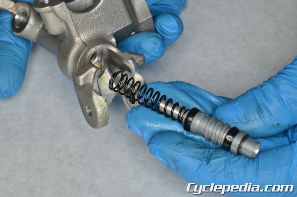 Honda 2012 CRF250R front brake master cylinder rebuild brake pads caliper lever replacement fluid bleeding